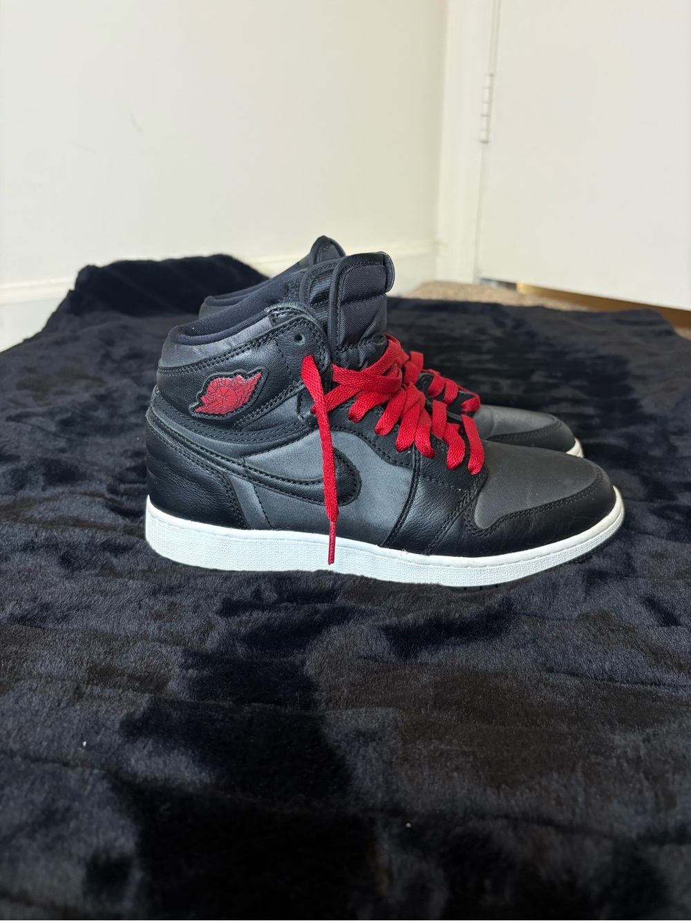 Jordan Black High-Top Sneakers with Red Accents